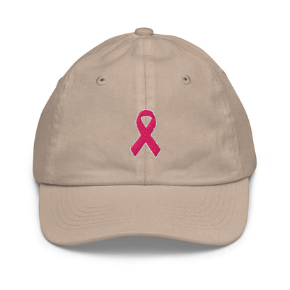 Front view of a khaki kids baseball hat with an embroidered pink awareness ribbon