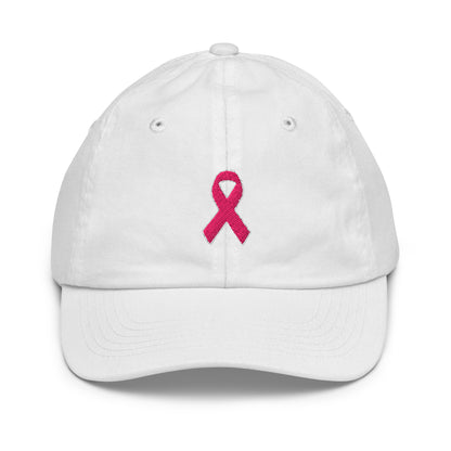 Front view of a white kids baseball hat with an embroidered pink awareness ribbon